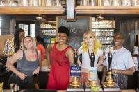 Photo of bar staff at the Fellowship and Star at the Fellowship launch event in July